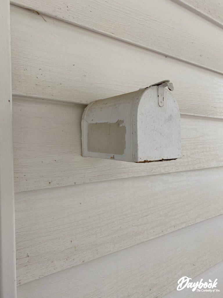 tiny mailbox on the wall