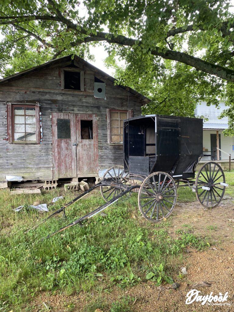 Old Amish barn with buggy in front