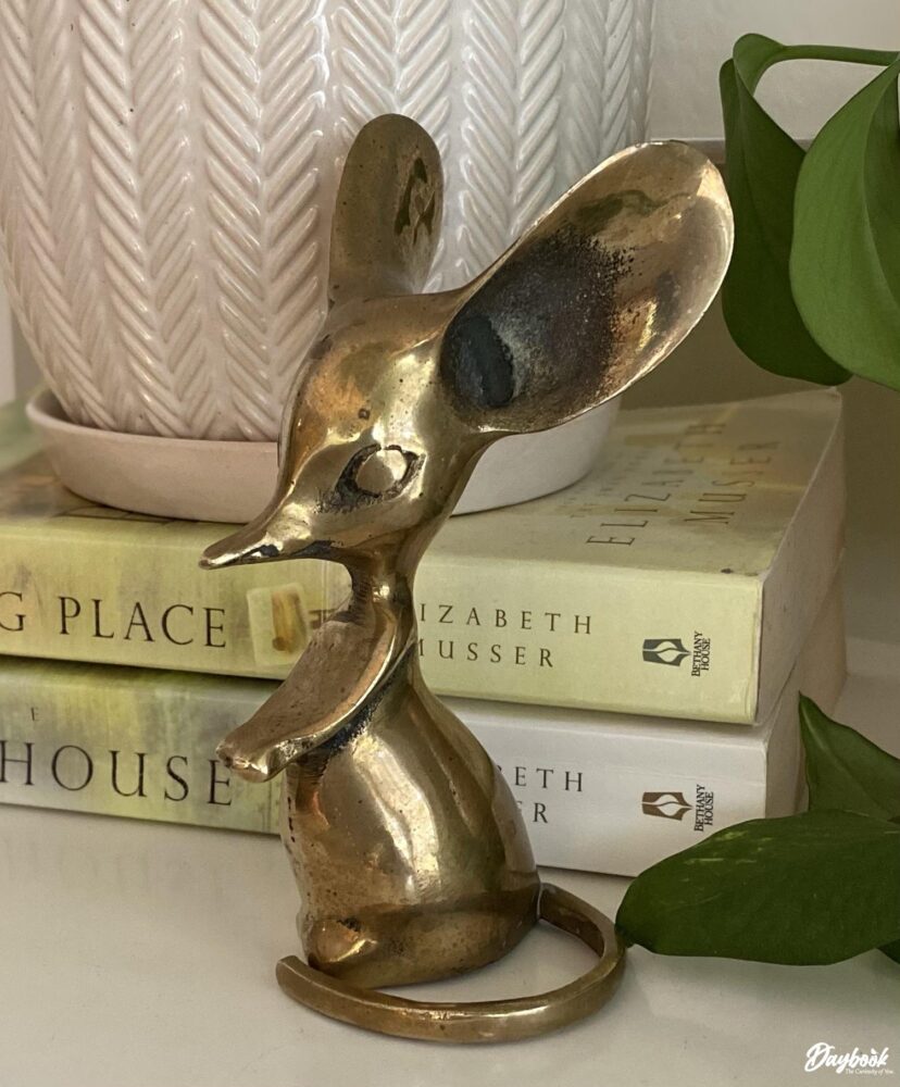 brass mouse figure with big ears