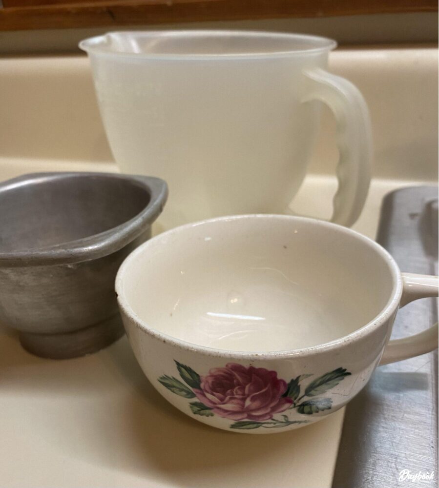 china cup and metal funnel
