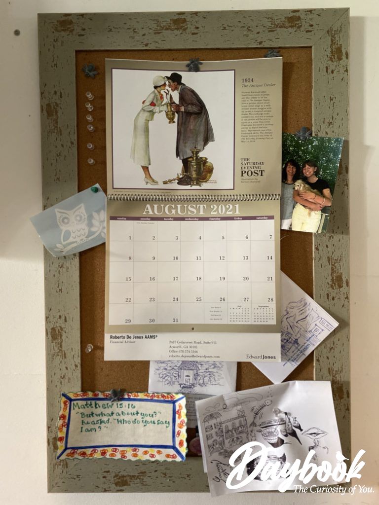 Calendar hanging on a bulletin board