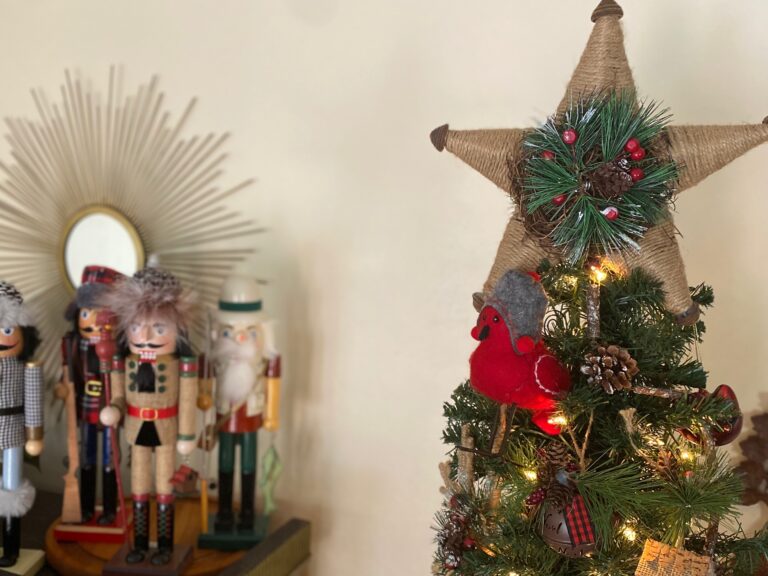 An upclose view of Christmas tree and nutcrackers