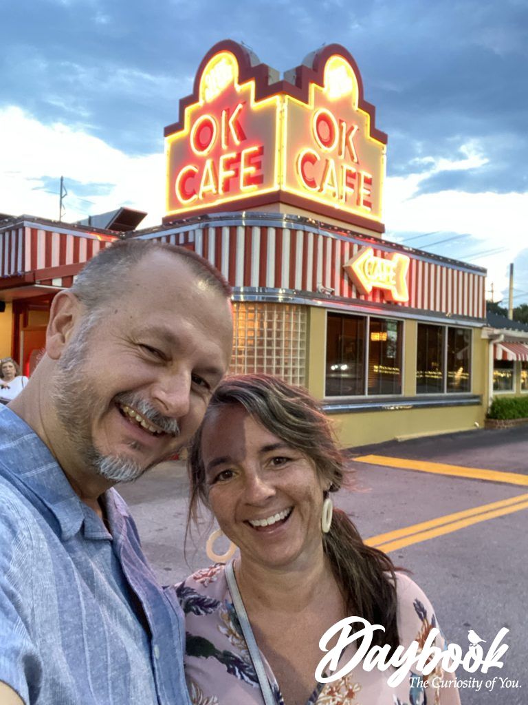 man and woman in front of Ok Cafe Restaurant