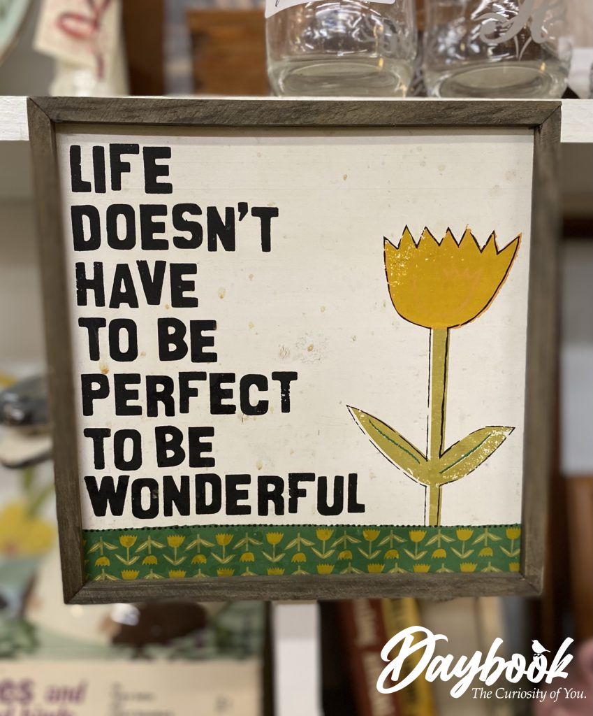 painted sign reading Life Doesn't Have to be Perfect to be Wonderful