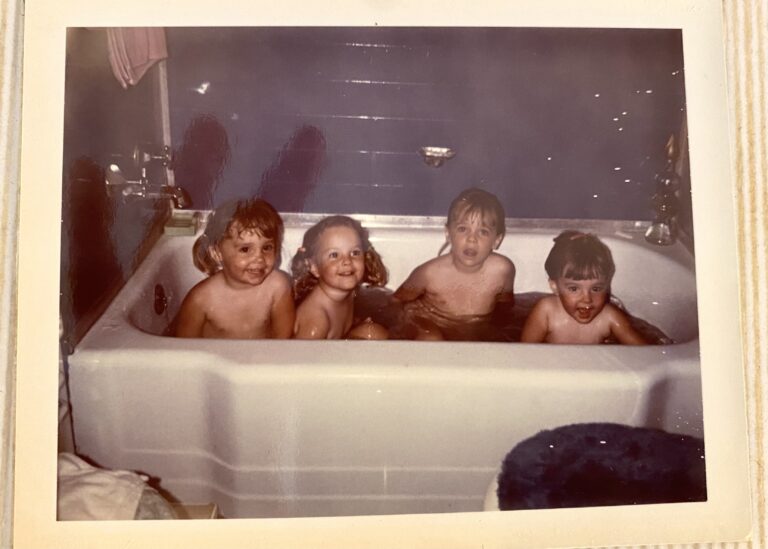 Four cousins in a vintage bathtub in 1974.